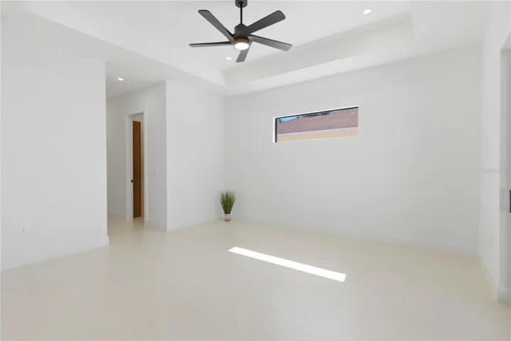 Generous layout includes a comfortable seating area, creating a serene retreat with plenty of room to unwind.