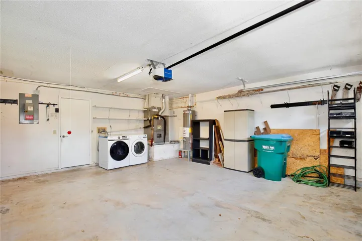 oversized garage with workshop & new overhead door