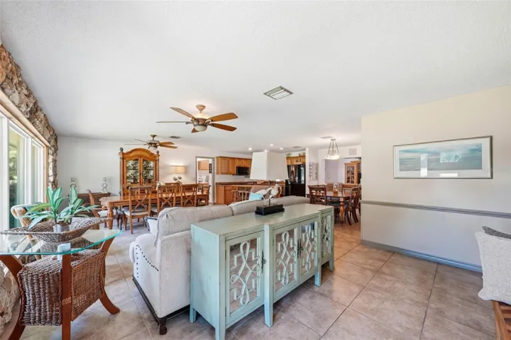 View upon entering the front door into the entry foyer-Great room and kitchen area