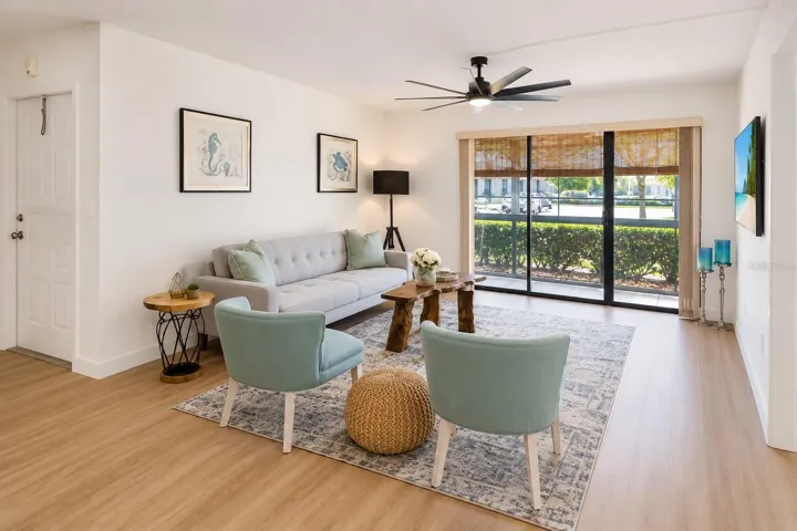 Living room w screen patio in background