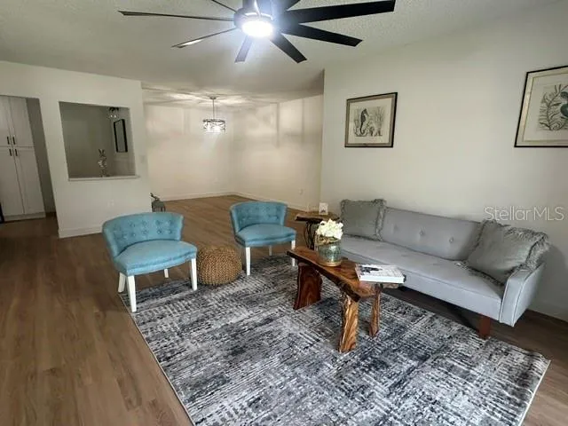 Living room with Dining room in background