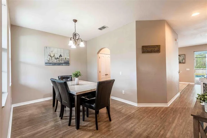Dining room flows into kitchen and great room.