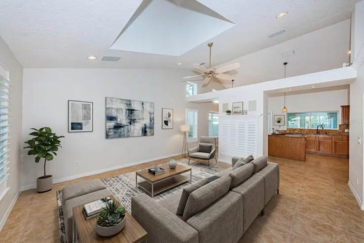 Living room with vaulted ceilings - staged