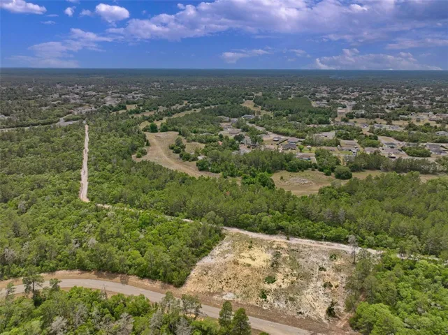 Overall view of subject property and surrounding area facing southwest