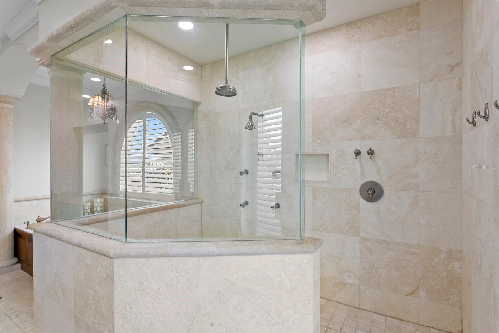 Top level primary ensuite with soaking tub and walk-in shower.