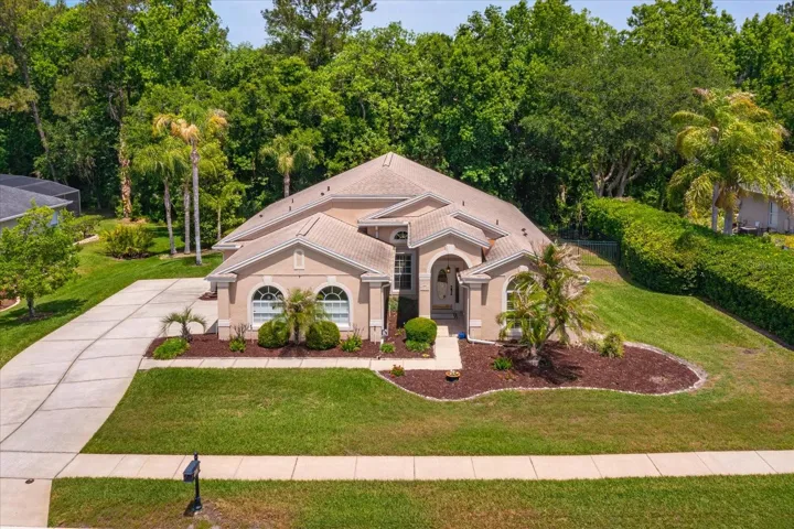 Lushly landscaped half acre conservation homesite with new roof in 2020
