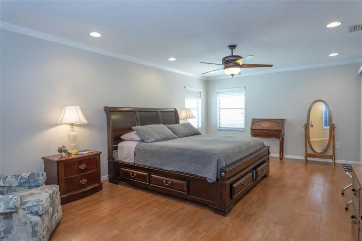 Primary bedroom crown molding, recessed lighting