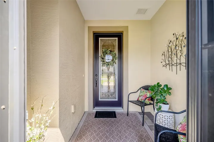 Elegant entry with lead glass door.
