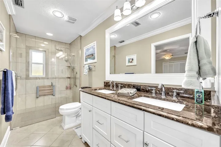 Renovated Primary Bath with large walk in shower with seat
