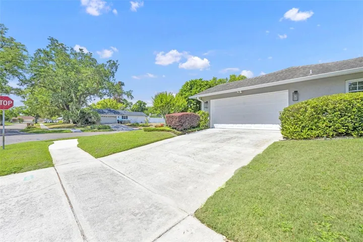 Corner lot with side entry garage.