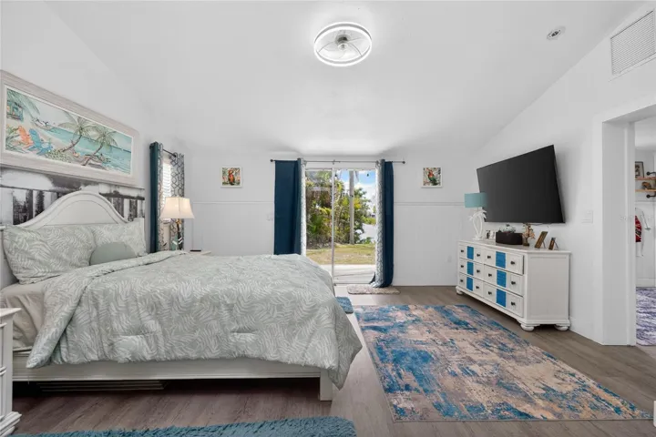 Primary bedroom overlooking canal.