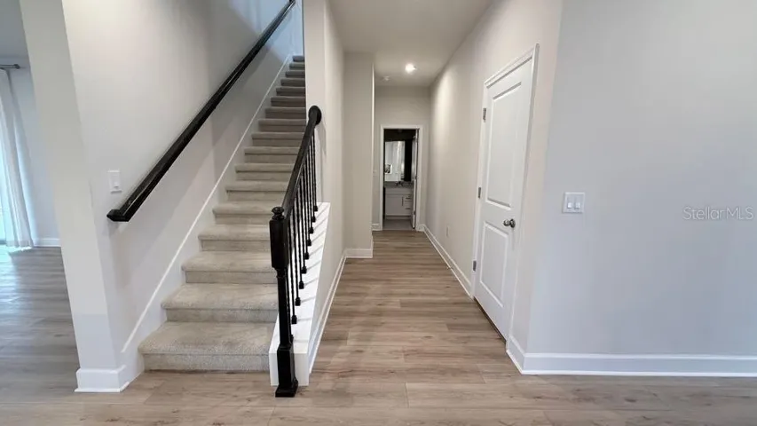 Hall to full bath and bedroom #1