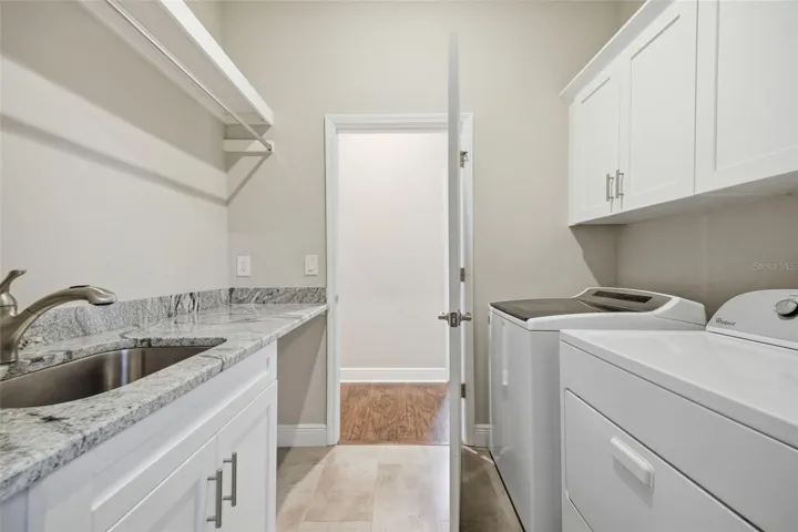 Laundry room just in off the garage entry