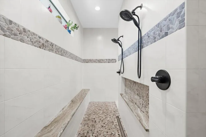 Wraparound Walk-In Shower With Floor-To-Ceiling Custom Tile