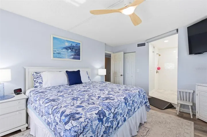 spacious primary bedroom with en suite bath
