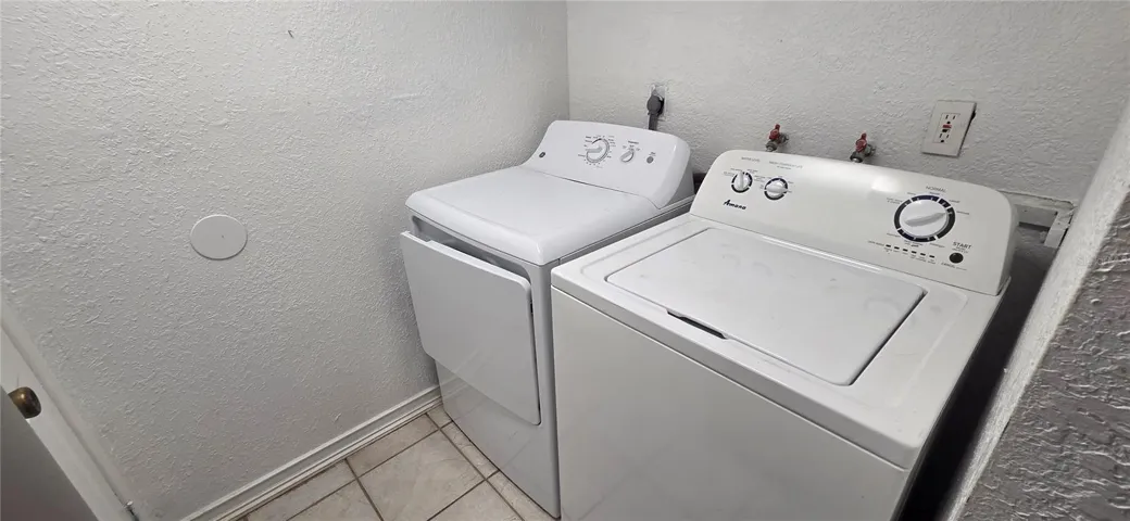 Laundry Room adjacent to kitchen