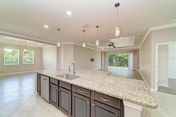 Kitchen into Dining and Great rooms
