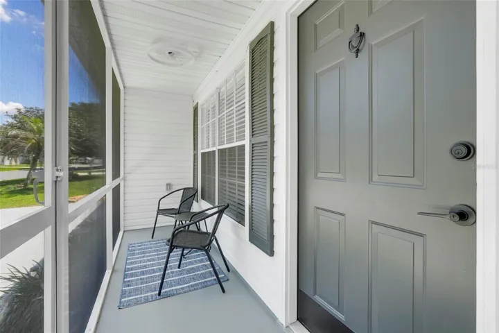INSIDE FRONT SCREENED PORCH