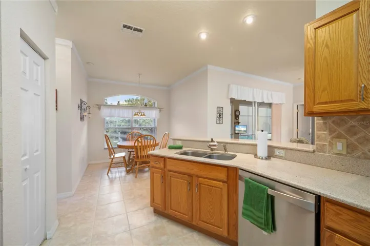 Kitchen pantry, breakfast nook at rear