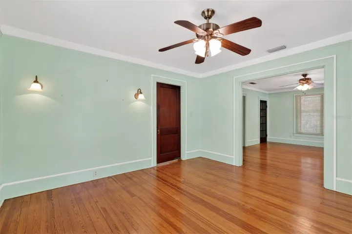 Dining Room w/Kitchen Door and view to Living Room