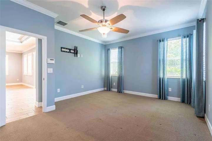 Another view of the primary bedroom.