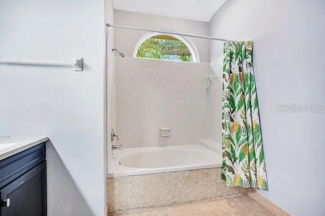 Secondary bathroom with a convenient tub and shower combination.