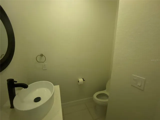 1/2 bath off kitchen