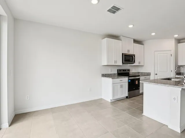 Interior photos are not of the actual home but are photos of the builder home with the same floorplan with similar interior finishes and features.