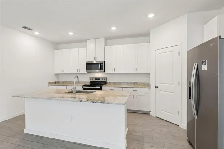 The interior photos are of another home with the same floor plan and interior finishes. Some details may vary