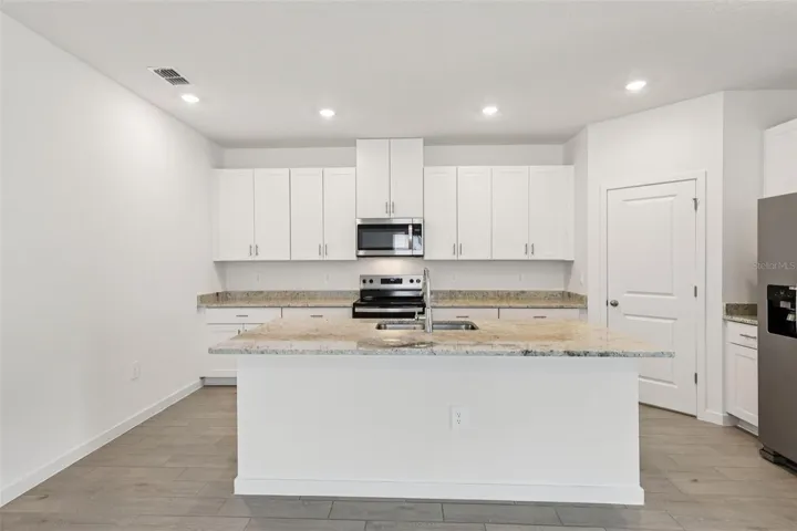 The interior photos are of another home with the same floor plan and interior finishes. Some details may vary