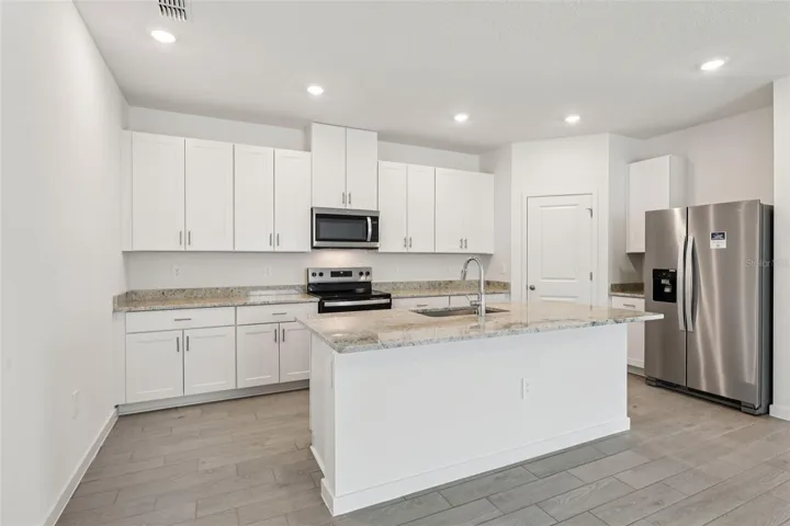The interior photos are of another home with the same floor plan and interior finishes. Some details may vary