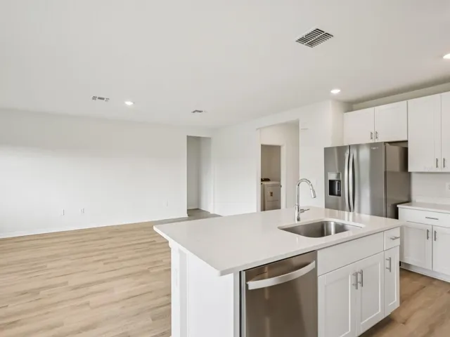 Interior photos are not of the actual home but are photos of the builder home with the same floorplan with similar interior finishes and features.