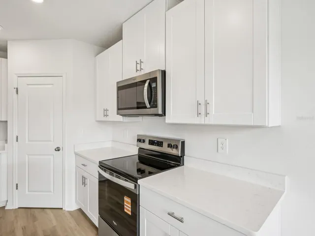 Interior photos are not of the actual home but are photos of the builder home with the same floorplan with similar interior finishes and features.
