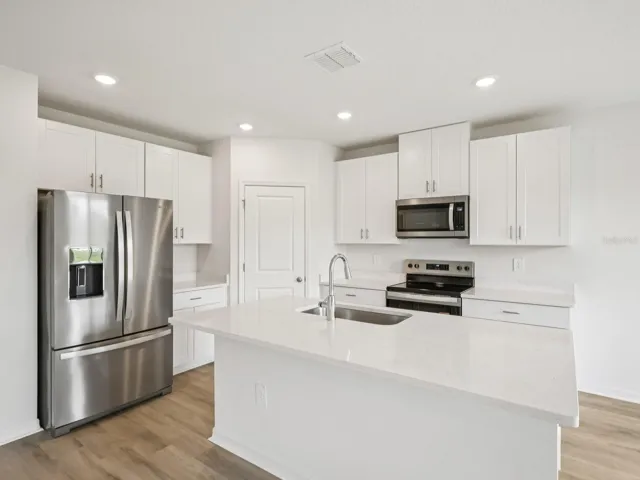Interior photos are not of the actual home but are photos of the builder home with the same floorplan with similar interior finishes and features.
