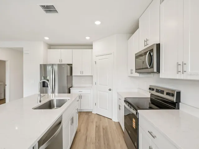 Interior photos are not of the actual home but are photos of the builder home with the same floorplan with similar interior finishes and features.