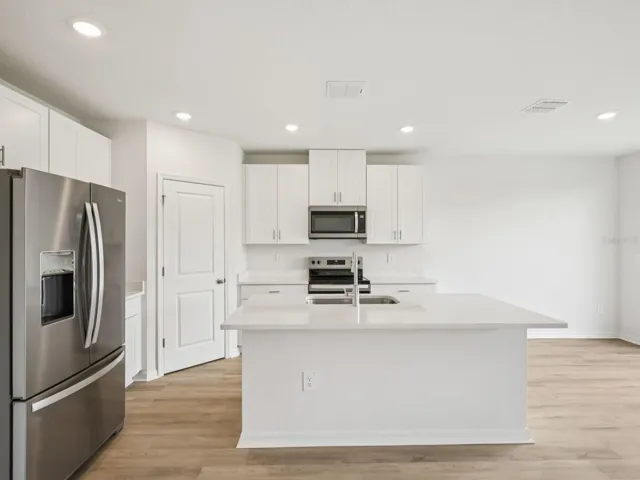 Interior photos are not of the actual home but are photos of the builder home with the same floorplan with similar interior finishes and features.