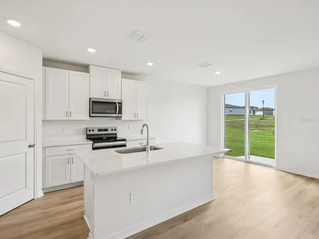 Interior photos are not of the actual home but are photos of the builder home with the same floorplan with similar interior finishes and features.