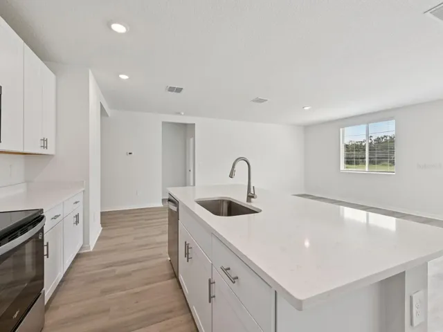 Interior photos are not of the actual home but are photos of the builder home with the same floorplan with similar interior finishes and features.