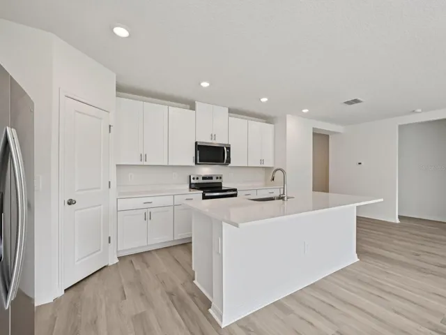 Interior photos are not of the actual home but are photos of the builder home with the same floorplan with similar interior finishes and features.