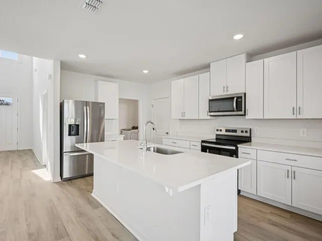 Interior photos are not of the actual home but are photos of the builder home with the same floorplan with similar interior finishes and features.