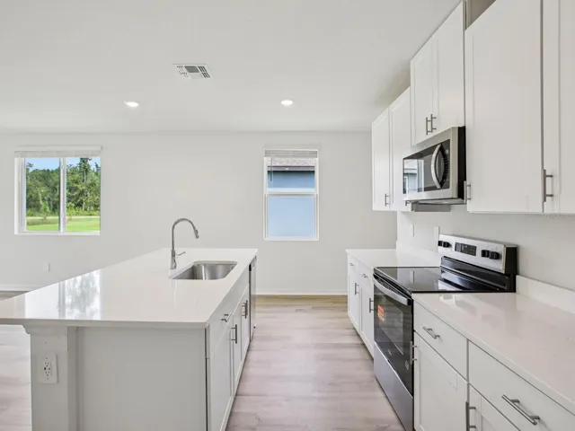 Interior photos are not of the actual home but are photos of the builder home with the same floorplan with similar interior finishes and features.