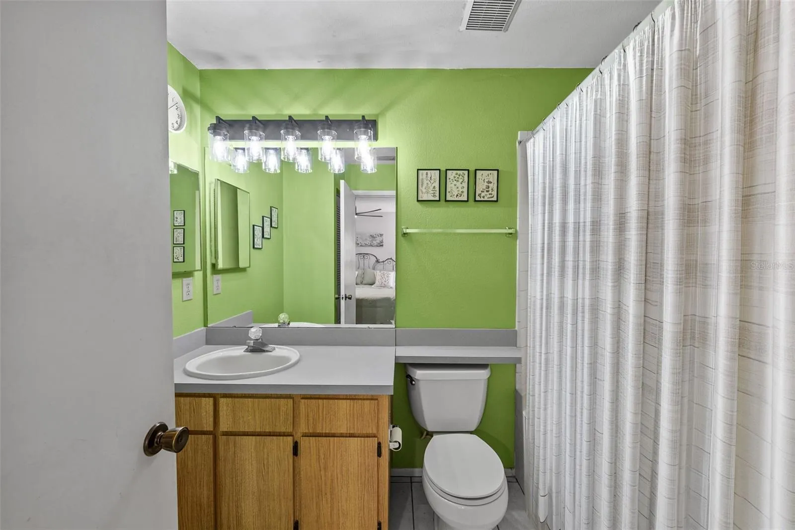 Primary bathroom with vanity and great storage.