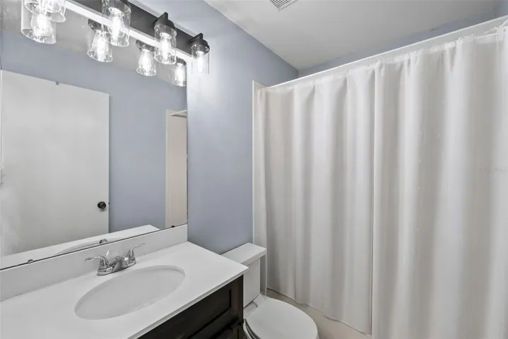Secondary bathroom with fresh paint.
