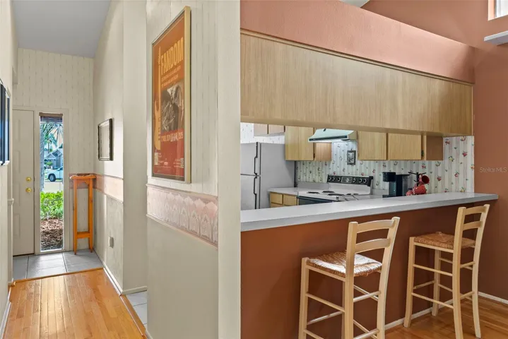 Breakfast bar connecting the kitchen to the main living area.