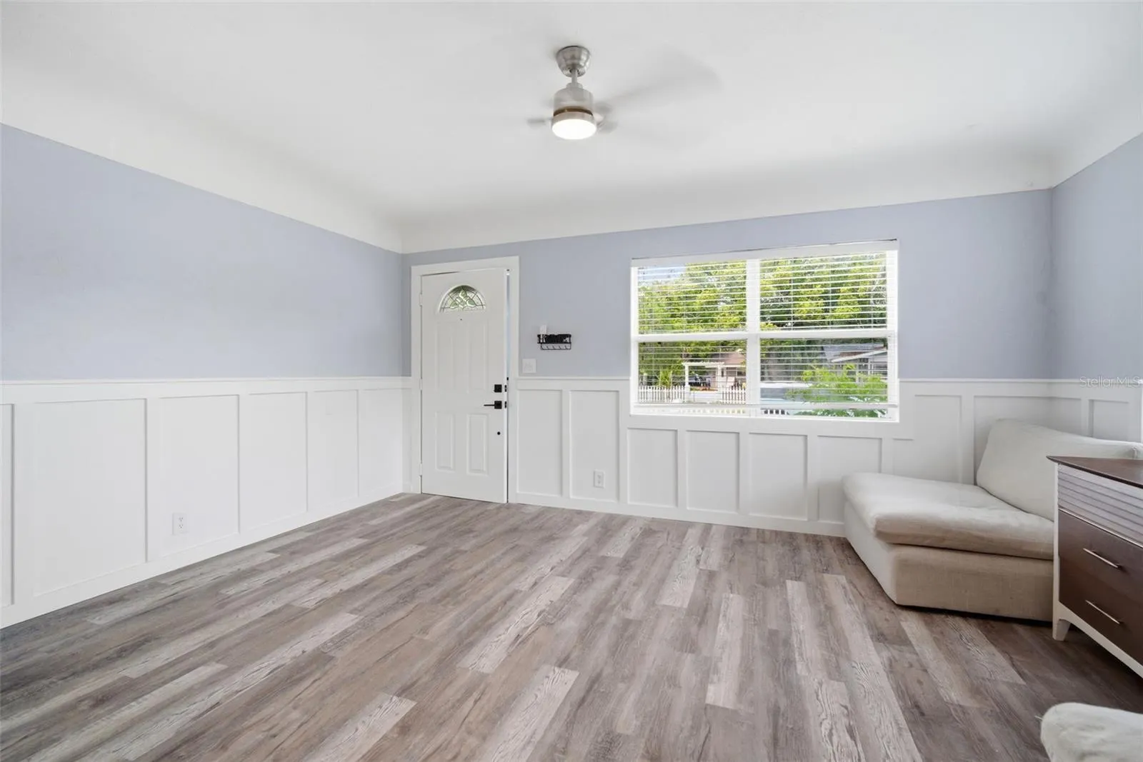 Front door photo from kitchen entry. Bed 1 and 2 to the left.