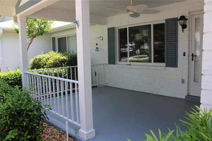 Relaxing Front Porch with Ceiling Fan