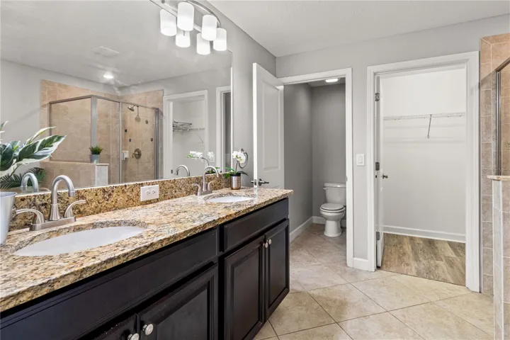 Double vanities and a huge walk in closet