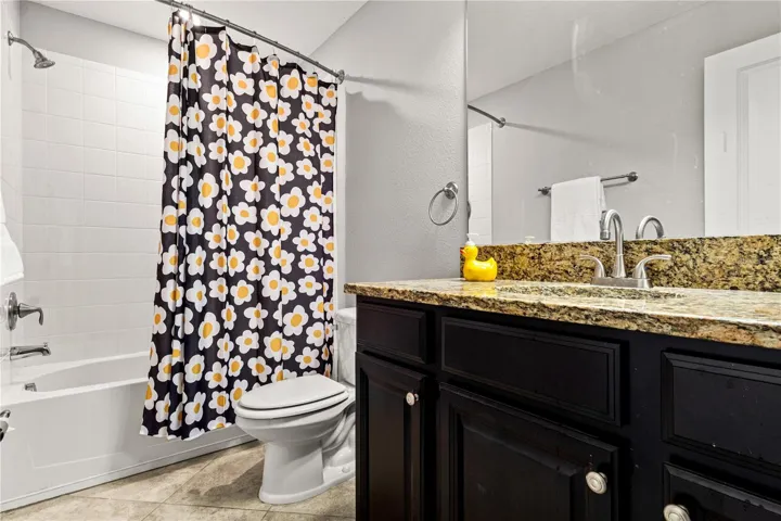 Secondary bathroom with a tub/shower combo