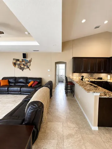 family room looking toward corridor to the 2nd/3rd bedrooms