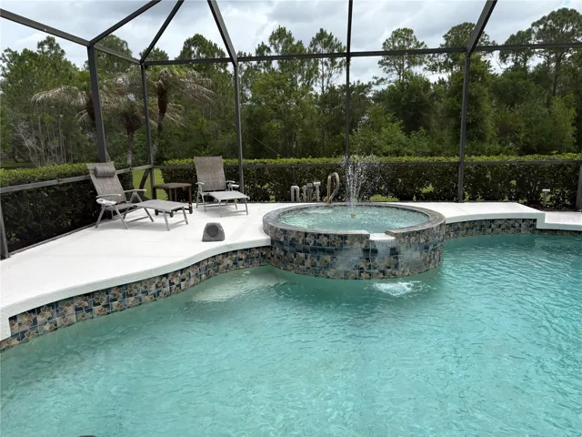 Pool with hot tub